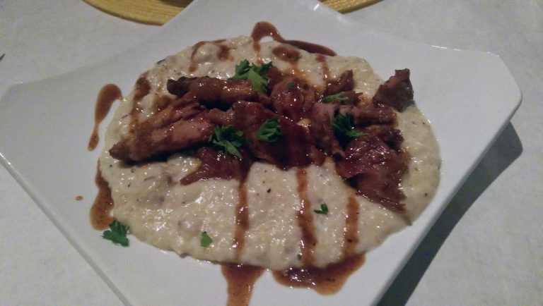 pulled pork over grits 1 768x434